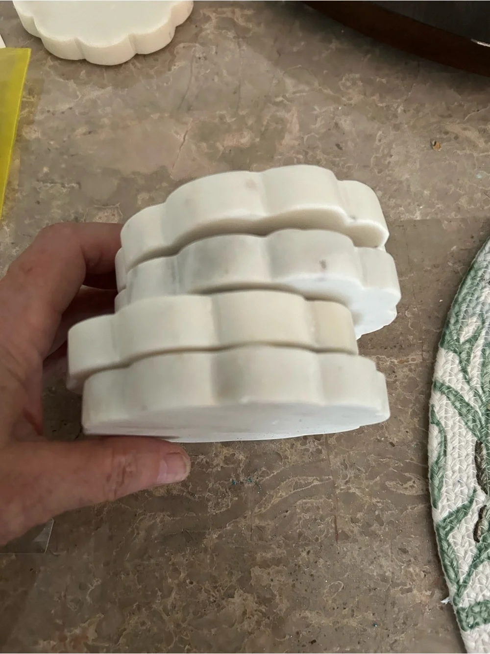 Rounded marble coasters with bottom protectors, set of four